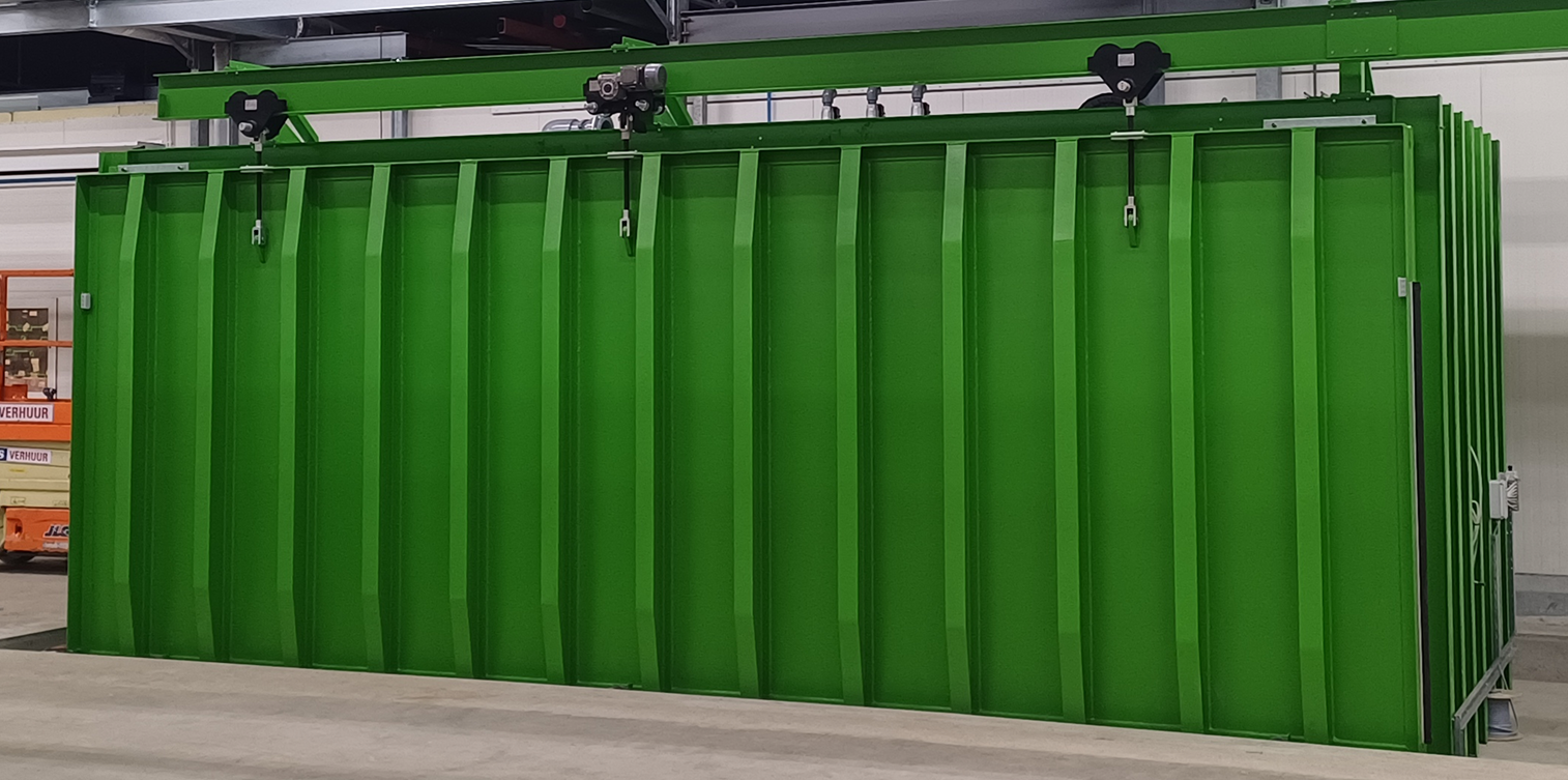 A green vacuum cooler created by JP Vacuum Coolers Limited.